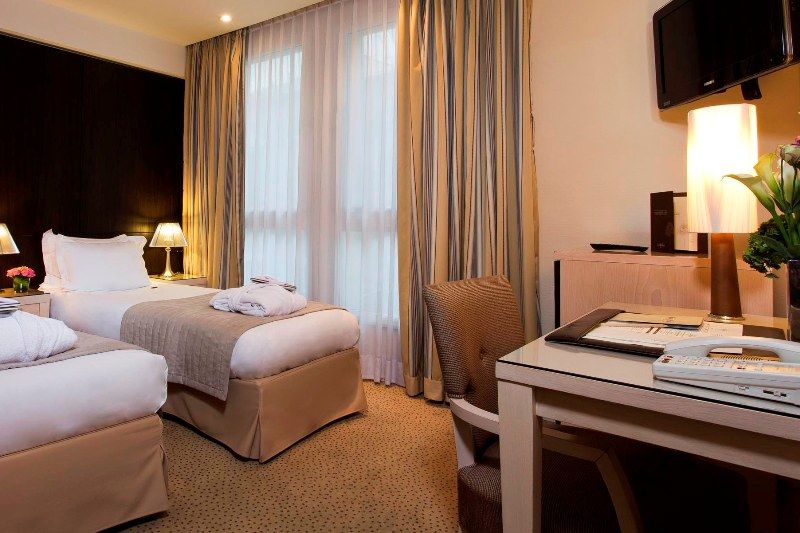 Hotel Le Pera Paris Bagian luar foto