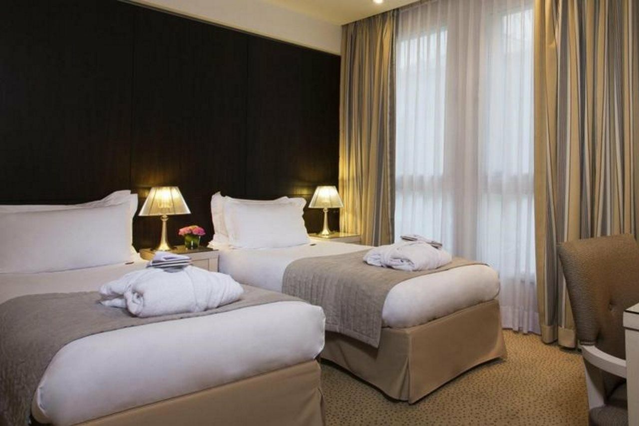 Hotel Le Pera Paris Bagian luar foto